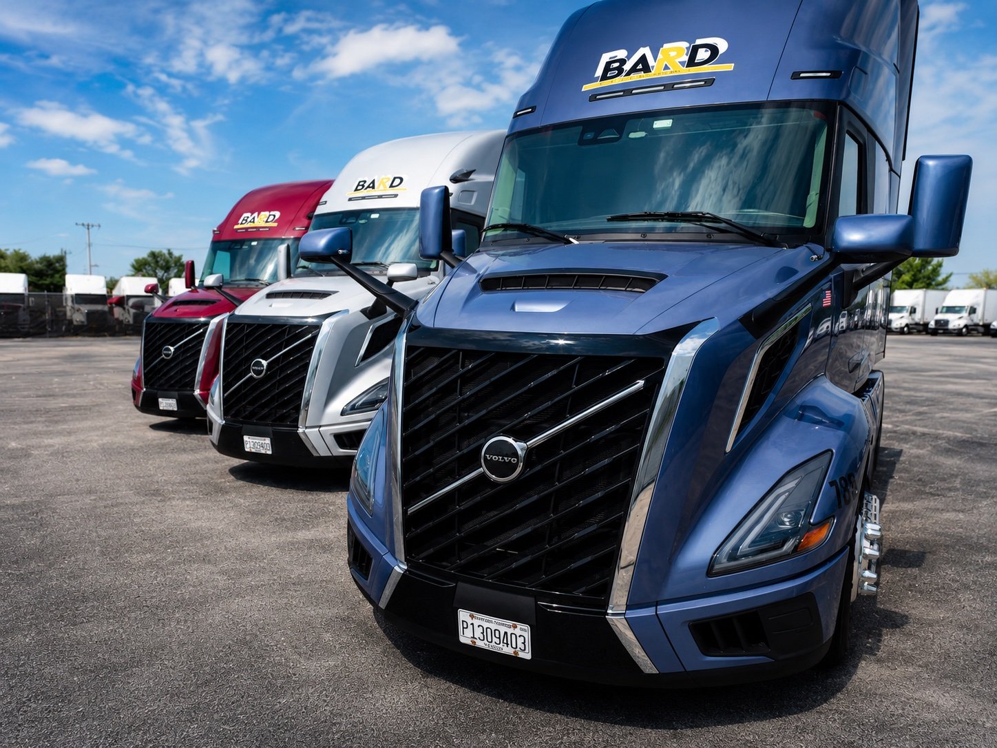 Recruiting illustration of blue, silver, and red BARD Volvo trucks